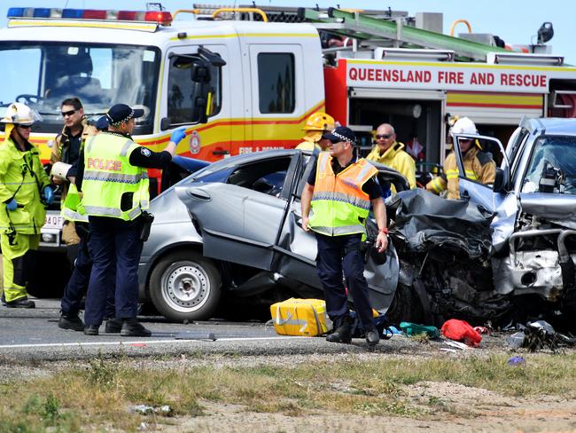 Emergency services attend a 3 person fatal crash involving four vehicles south of Townsville. Picture: Alix Sweeney