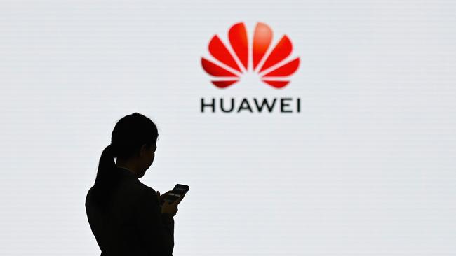 A Huawei user in China. Pic: AFP