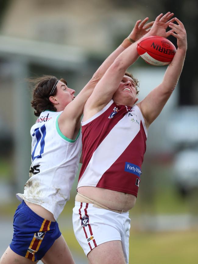 Moe’s Lachlan McGrath attempts to spoil Traralgon’s Jacob Van Iwaarden.