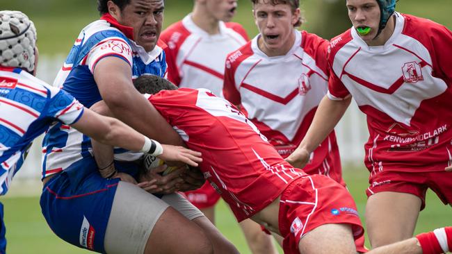 07/06/25. News Local. Sport. Merrylands, Sydney, NSW.Action pictures from the NSW Rugby Juniors 2025 State Championships  Under 16s in Merrylands.Action from the game:Hunter v Central NorthPicture shows:Central north player Jedd Smallwood tackles a much bigger opponent.Pics by Julian Andrews.