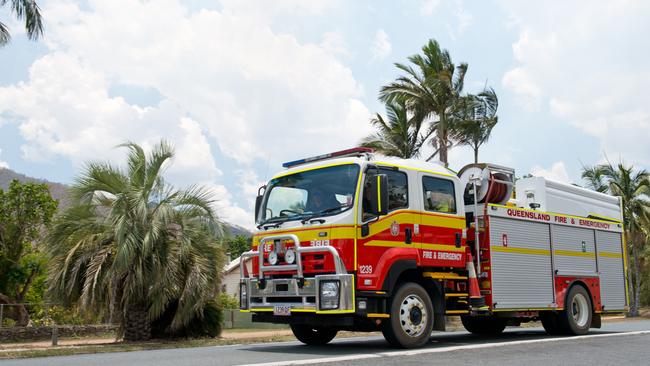 A fire truck returns to Finch Hatton to refill with water. QFES generic