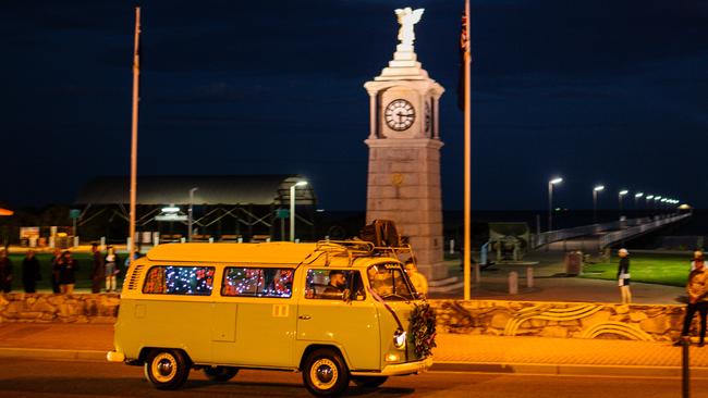 The Kindness Kombi van played the dawn service bugle to few people for Anzac Day at the Semaphore Foreshore Memorial last year. Pic: Morgan Sette