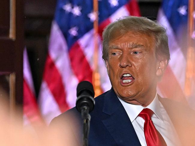 Former US President Donald Trump gestures after delivering remarks at Trump National Golf Club Bedminster in Bedminster, New Jersey, on June 13, 2023. Trump appeared in court in Miami for an arraignment regarding 37 federal charges, including violations of the Espionage Act, making false statements, and conspiracy regarding his mishandling of classified material after leaving office. (Photo by Ed JONES / AFP)