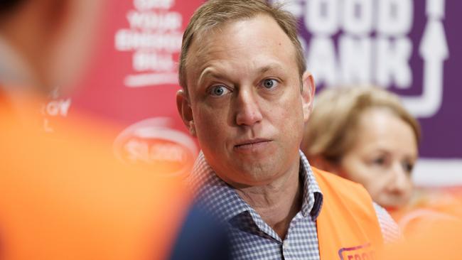 Premier Steven Miles addresses the media at Foodbanks warehouse facility at Morningside on Sunday morning. Picture Lachie Millard