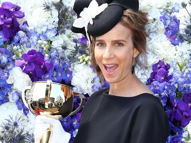 Rachel Griffiths poses with the Melbourne Cup at the Kennedy Marquee. Picture: Scott Barbour, Getty Image.