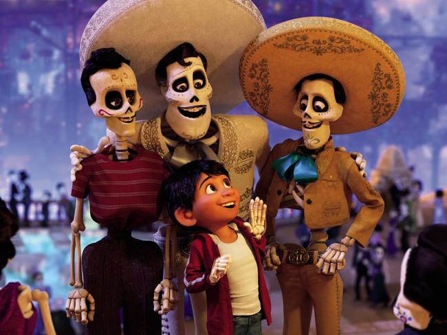 Miguel (front, voiced by Anthony Gonzalez) is a young boy transported to the Land of the Dead in search of his idol Ernesto de la Cruz (centre). Picture: Disney Pixar.