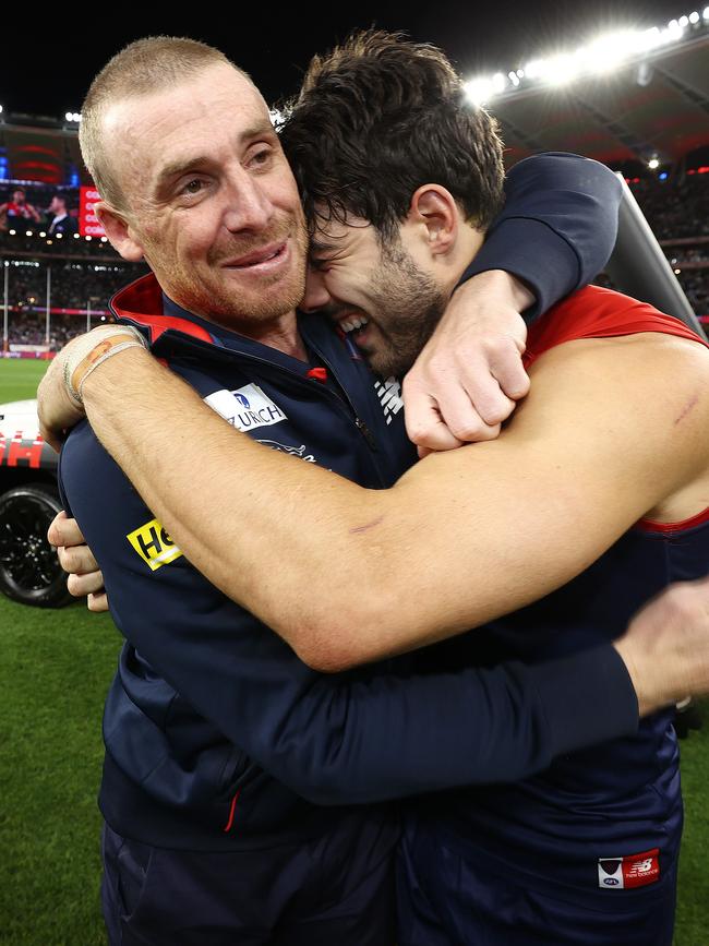 Simon Goodwin shares a moment with Petracca post-game. Picture: Michael Klein