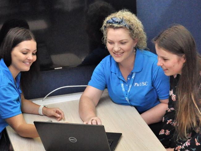 USC B Block Gympie campus 2020 - the biggest intake ever will undergo orientation day this week. USC Gympie students Kristen Schlein, Hayley Brennan and Taylor Mosk try out the new learning space, which is designed for quiet individual study and group work.