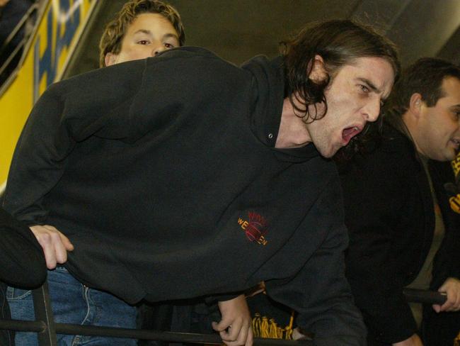 This fan makes gets his point across after a loss at Etihad Stadium in 2004.