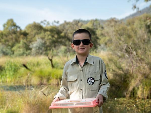 Airlie Beach resident Oliver Deighton released 30 critically endangered northern corroboree frogs back into Namadgi National Park as part of recovery program. Picture: Make-A-Wish Australia