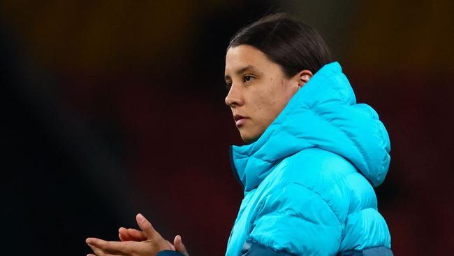 Injured Matildas captain Sam Kerr applauds the fans after her team's loss in the against Nigeria at Brisbane Stadium in Brisbane on July 27, 2023. Picture: Patrick Hamilton / AFP)