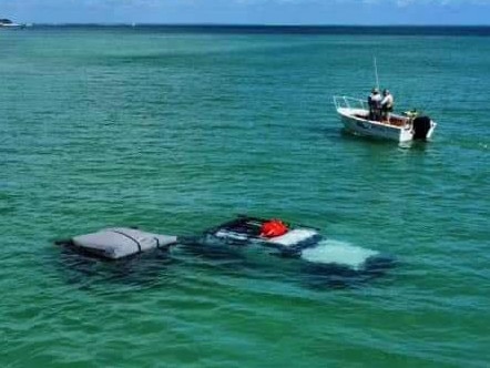 Incredible photos show a massive towing operation to recover a Jeep and camper trailer from the depths just off the shores of Kâgari (Fraser Island) over the weekend. Picture: Fraser Island Towing