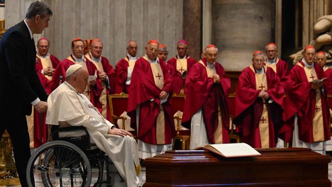 Pope Francis in a wheelchair at the funeral of Cardinal George Pell. Picture: AFP