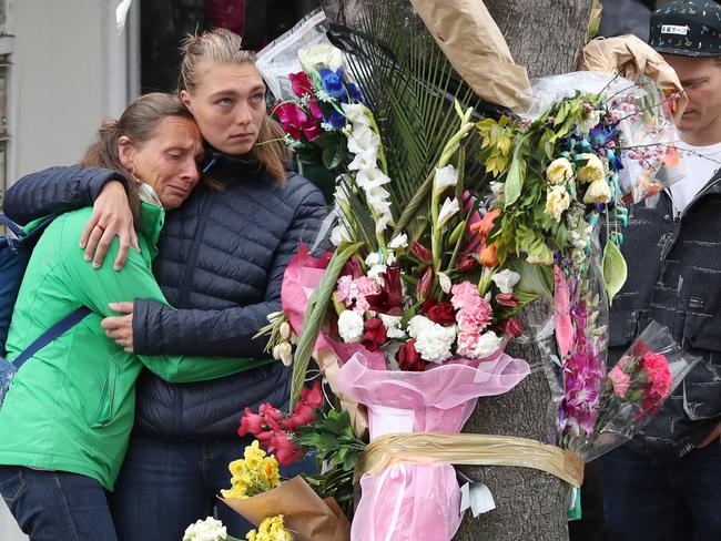 Gitta’s heartbroken mother and sister embrace at the scene. Picture: David Crosling