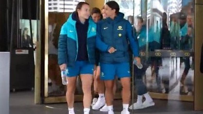 A still shot taken from footage of Caitlin Foord (left) and a bandage-free Sam Kerr during the Matildas’ team walk on Wednesday afternoon. Footage: FFA