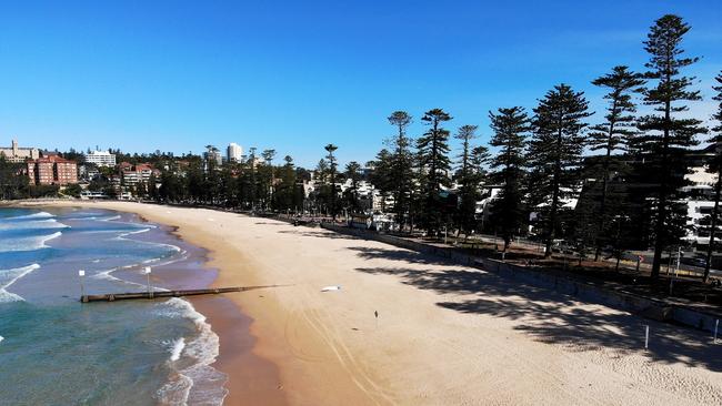 Pictured is a deserted Manly Beach. Northern Beaches Council has made the decision to close the beaches given the high number of cases on the peninsula. Picture: Cameron Spencer