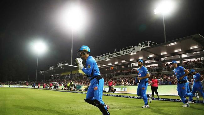 Alex Carey leads the Strikers onto the field during the Big Bash League (BBL) cricket match between the Sydney Sixers and Adelaide Strikers at Coffs International Stadium in Coffs Harbour, Sunday, January 5, 2020. (AAP Image/Jason O'Brien). Picture: JASON O'BRIEN