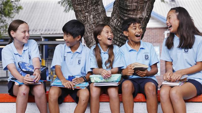 Five Dock Public School students Violet Tamest, Troy Tenoyo, Zara Pham, Fehoko Fotofili and Charlotte Hsu enjoy a positive learning environment at Five Dock. Picture: Sam Ruttyn