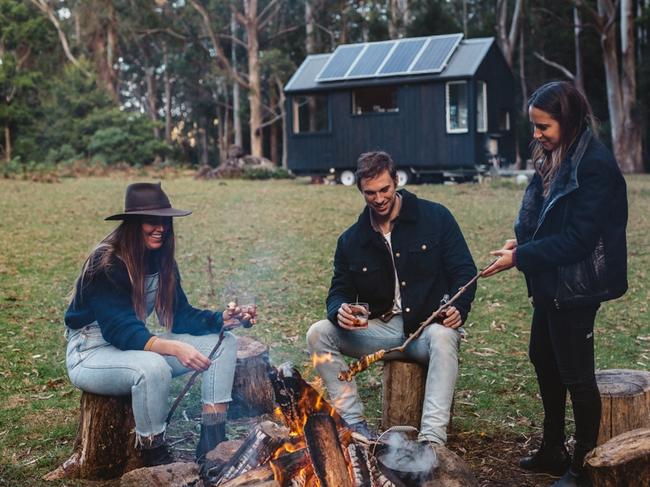 Chris Grant from Unyoked (centre) gets into the outdoor experience with two friends. Picture: Luisa Brimble