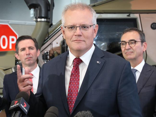 ADELAIDE, AUSTRALIA - NewsWire Photos March 31, 2021:  Prime Minister Scott Morrison in Adelaide to visit space and defence industries. (LtoR) Finance Minister Simon Birmingham, PM Scott Morrison, and SA Premier Steven Marshall. Picture: NCA NewsWire / Dean Martin