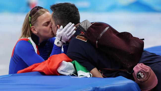 Arianna Fontana of Team Italy celebrates with a kiss. Photo by Matthew Stockman/Getty Images.