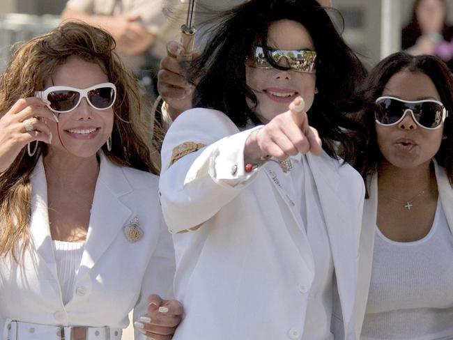 LaToya Jackson (L) with siblings Michael and Janet Jackson in 2004. Picture: AFP