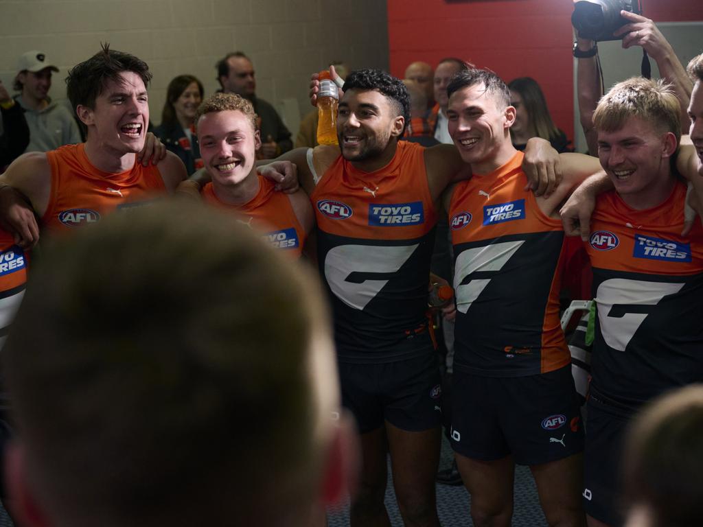 CANBERRA, AUSTRALIA – JULY 23: Giants players celebrate victory during the round 19 AFL match between Greater Western Sydney Giants and Gold Coast Suns at Manuka Oval, on July 23, 2023, in Canberra, Australia. (Photo by Brett Hemmings/AFL Photos/via Getty Images)