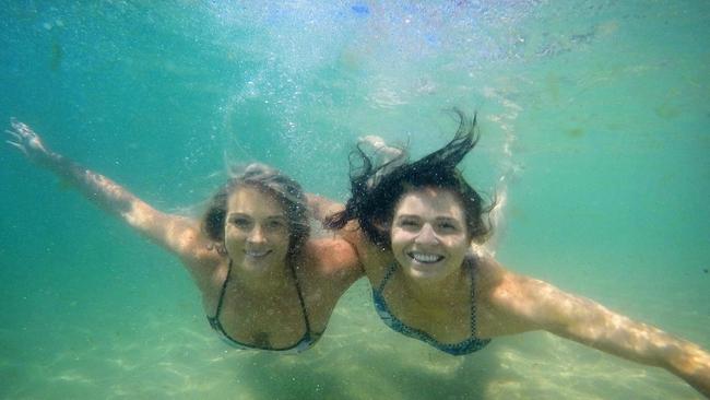 Lea Yanitsas and friend and Rio team mate Keesja Gofers at South Maroubra, preparing for last month’s ocean swim at the Sydney International Beach Festival at Cronulla. Picture:  Mark Evans