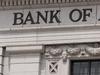 (FILES): This August 19, 2011 file photo shows the Bank of America logo outside a bank branch in Washington, DC, on August 19, 2011. Bank of America has tentatively agreed to pay a record $16-$17 billion US settlement to resolve allegations it misled investors on mortgage-linked securities, a person familiar with the matter said August 6, 2014. The Justice Department settlement covering securities sold ahead of the housing bust is expected by next week, according to the source, who spoke on the condition of anonymity confirming reports in US media. AFP PHOTO / Saul LOEB / Files