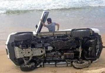 A driver in a new looking Prado is the latest victim of soft sand and big drop offs on Teewah beach.