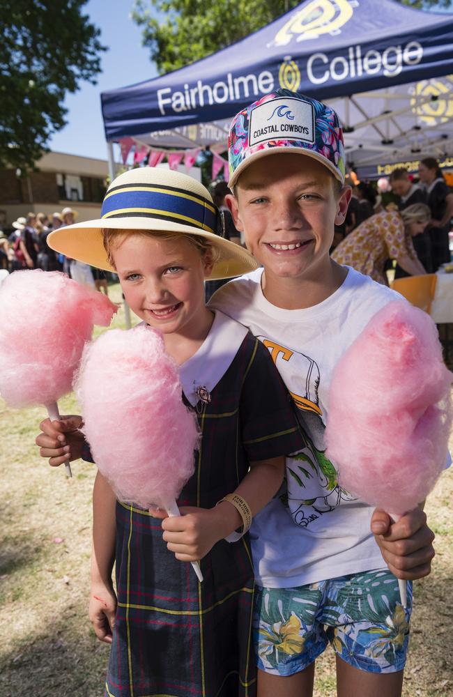 Jemima and Fred Hudson enjoy fairy floss at the Fairholme College Spring Fair, Saturday, October 21, 2023. Picture: Kevin Farmer