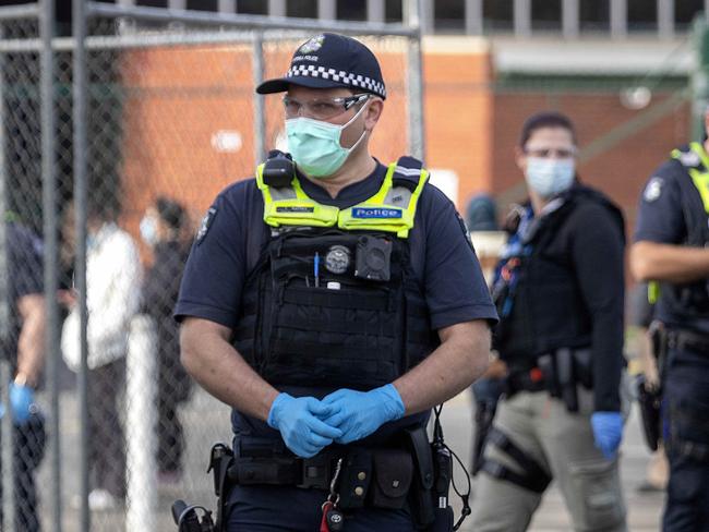 MELBOURNE, AUSTRALIA - NewsWire Photos June 6, 2021: Police on the lookout for protestors at the Vaccination centre at Sandown Racecourse.Picture: NCA NewsWire / David Geraghty