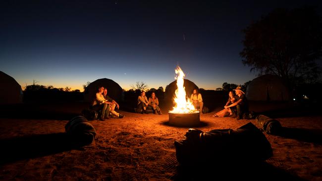 What transpires is a conversation among strangers that can only happen around a campfire after a glass (or two) of wine. Picture: Shaana McNaught.