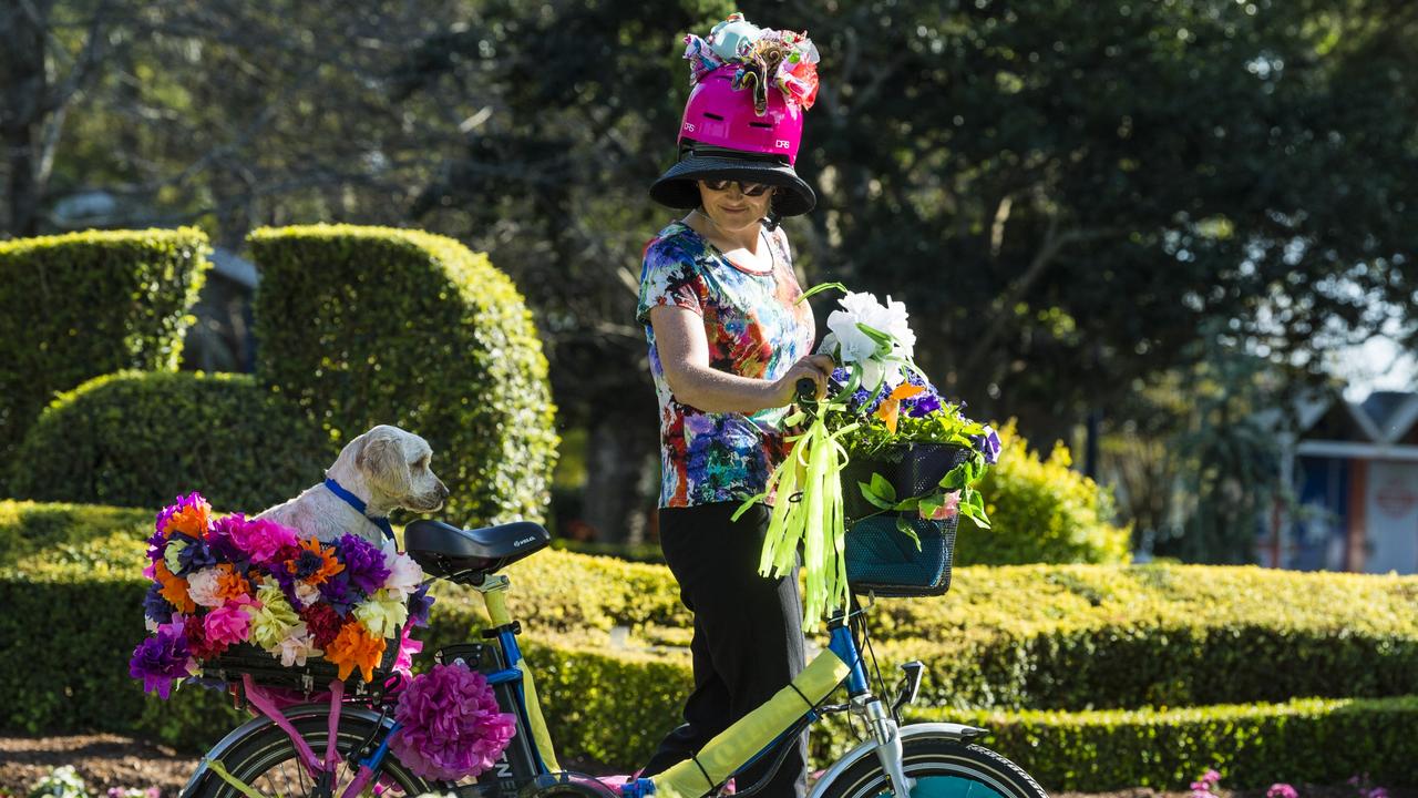 Kathleen Flanagan and Teddy, in Laurel Bank Park, on the way to join the Toowoomba For Climate Action entry in the floral parade of the Carnival of Flowers, Saturday, September 18, 2021. Picture: Kevin Farmer