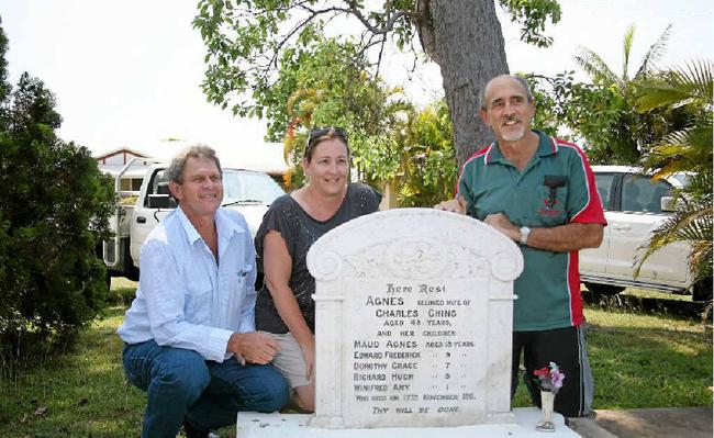 Descendents of the survivors, including (from left) Paul Steindl, Hanni Steindl and Lance Steindl, at the family grave in Sarina Cemetery, will meet this week to pay their respects to their slain ancestors. Picture: Lee Constable