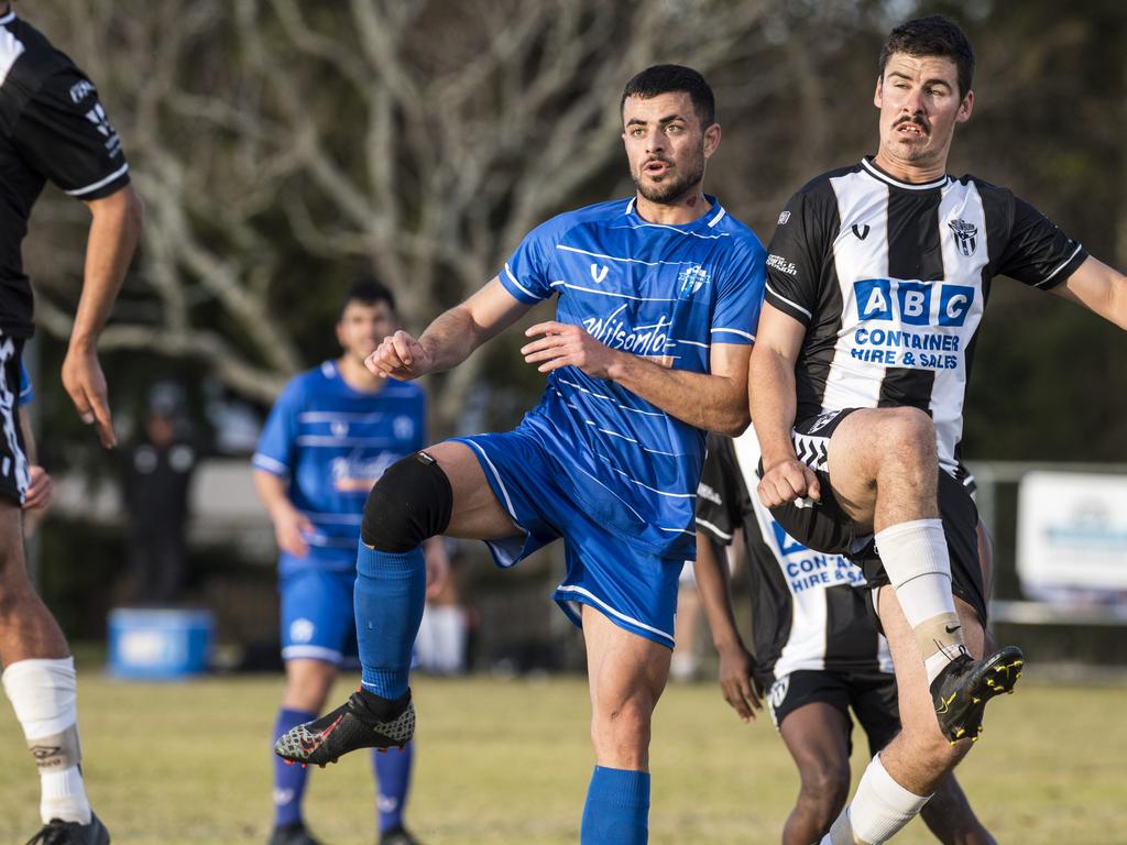 Maysar Qaso (left) of Rockville Rovers and Beau Partridge of Willowburn in Toowoomba Football League Premier Men round 13 at Captain Cook reserve, Sunday, June 20, 2021. Picture: Kevin Farmer