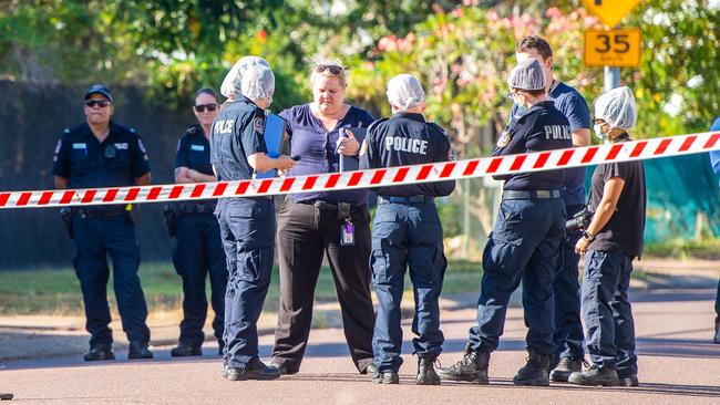 NT police investigate the incident in Karama where a man has been stabbed and killed and a woman injured. Picture: Che Chorley