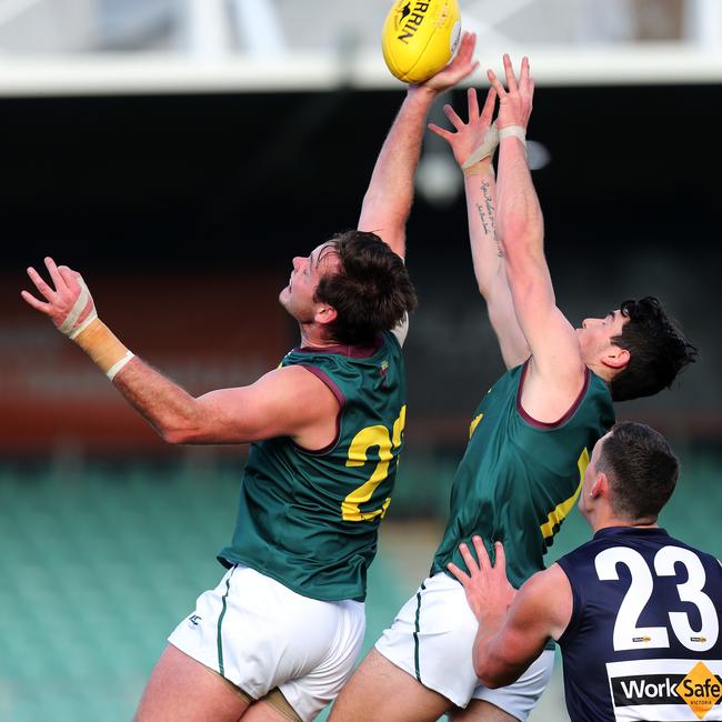 Alexander Lee attempts to mark during the game against Vic Metro. Picture: CHRIS KIDD