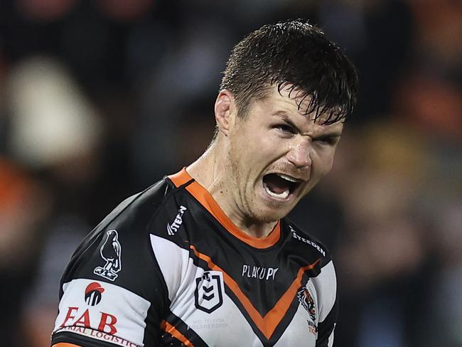 SYDNEY, AUSTRALIA - JUNE 02:  John Bateman of the Tigers celebrates after a Tigers try during the round 14 NRL match between Wests Tigers and Canberra Raiders at Campbelltown Stadium on June 02, 2023 in Sydney, Australia. (Photo by Cameron Spencer/Getty Images)