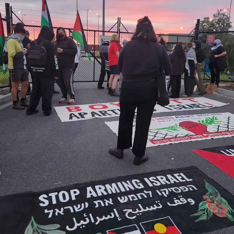 Palestine activists staging protest outside Port Melbourne shipping terminal.