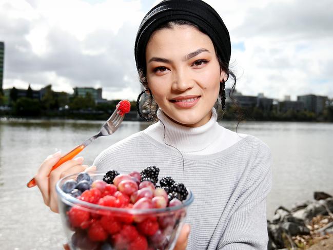 Razia Khalili, with bowl of berries for story on stress diet, West End, Wednesday 10th June 2020 - Photo Steve Pohlner