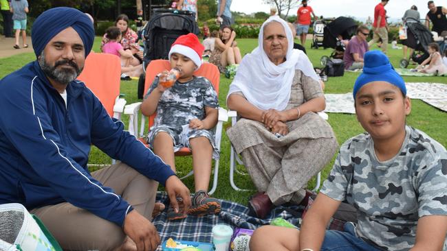 The Sohi family enjoy their time at the 2023 Buderim Community Carols.