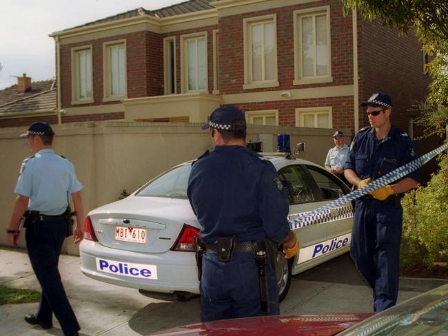 Police collect evidence from the residence of Matthew Wales in Glen Iris.