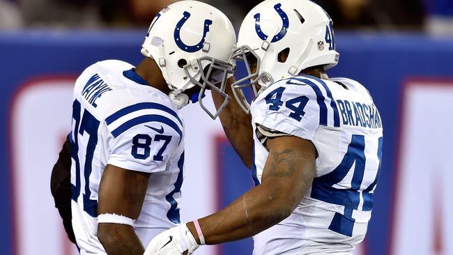 Reggie Wayne #87 of the Indianapolis Colts celebrates with Ahmad Bradshaw #44 after scoring a touchdown.