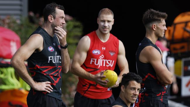 MELBOURNE, AUSTRALIA.February 8, 2024. Essendon AFL training at the Hangar, Tullamarine. Todd Goldstein, Ben McKay, Dylan Shiel and Archie Roberts during todays training session. Pic: Michael Klein