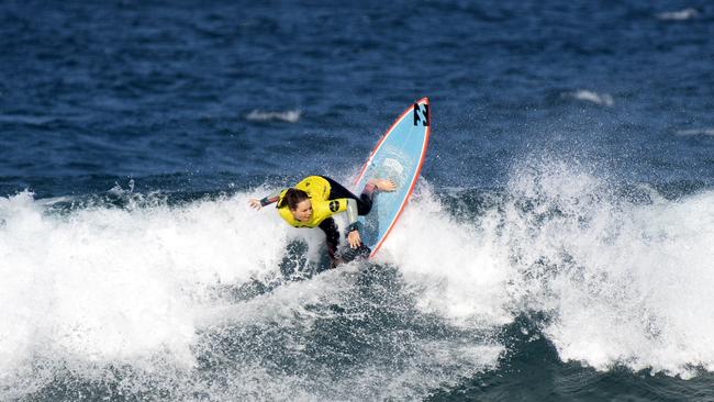 CARVING IT UP: Wooli surfer Carly Shanahan in the quarter finals of the Woolworths NSW Junior Surfing Titles in Coffs Harbour in 2019.