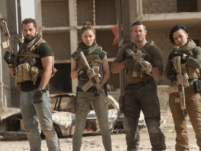 Daniel MacPherson with some of the cast from Strike Back (from left) Roxanne McKee, Warren Brown and Alin Sumarwata. Picture: Liam Daniel