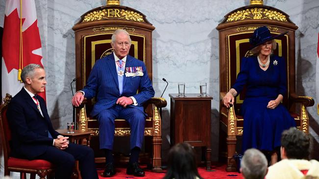 King Charles III and Queen Camilla, with Canadian Prime Minister Mark Carney (L), arrive to open the first session of the 45th Parliament of Canada at the Senate of Canada in Ottawa. Picture: AFP