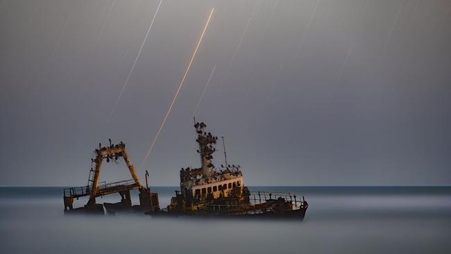 Zeila by Vikas Chander. This image was the winner in the People and Space category. The northern tip of Namibia’s Atlantic coast is one of the most treacherous coastlines in the world and has gained the name the Skeleton Coast. The ship in this photo, Zeila, was stranded on 25 August 2008 and is still in a well-preserved state.