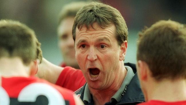 Neale Daniher pumps up the boys at three quarter time in 2002.